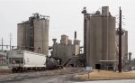 NS local train H75 heads east through the Nazareth Lehigh Heidelberg cement complex on its way to Stockertown